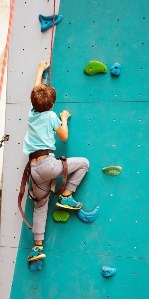 high-angle-view-boy-playing-with-toys-beach